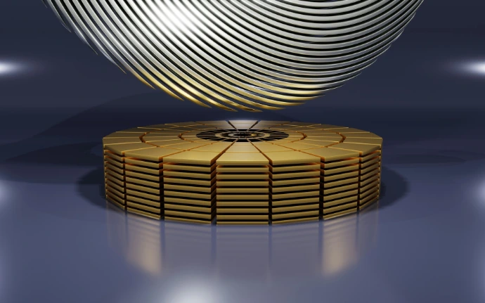 a stack of gold coins sitting on top of each other